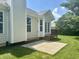 Spacious backyard with a concrete patio, small deck, and new siding at , Noblesville, IN 46060