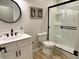 Modern bathroom featuring a sleek vanity, a new toilet, and a glass-enclosed shower at , Noblesville, IN 46060