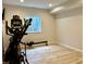 Well-lit exercise room with laminate floors and fitness equipment at , Noblesville, IN 46060