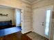 Inviting foyer with wood-look accent wall and entry to adjacent bedroom at , Noblesville, IN 46060