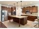 Spacious kitchen featuring an island with granite countertop and stainless steel appliances at , Noblesville, IN 46060