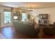Inviting living room features a stone fireplace, hardwood floors, and lots of natural light at , Noblesville, IN 46060
