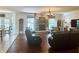 Spacious open concept living room with stone fireplace and adjacent dining area at , Noblesville, IN 46060