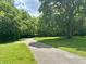 Scenic walking path through the community with lush greenery and mature trees at , Noblesville, IN 46060