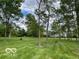 Large green backyard, perfect for outdoor activities at 11898 N 200 W, Fountaintown, IN 46130