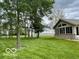 Lush backyard with mature trees at 11898 N 200 W, Fountaintown, IN 46130