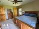 Cozy bedroom featuring a bed with nightstands and a window that lets in natural light at 11898 N 200 W, Fountaintown, IN 46130