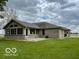 A well-maintained home exterior with large windows and a neatly kept lawn at 11898 N 200 W, Fountaintown, IN 46130