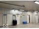 View of garage interior featuring metal construction and multiple doors at 11898 N 200 W, Fountaintown, IN 46130