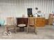 Garage interior featuring custom made wooden furniture with chairs and bar at 11898 N 200 W, Fountaintown, IN 46130