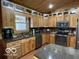 Well-appointed kitchen with custom wood cabinets and stainless steel appliances at 11898 N 200 W, Fountaintown, IN 46130