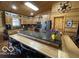 Large kitchen with custom wood cabinets, granite countertops, and a large island at 11898 N 200 W, Fountaintown, IN 46130