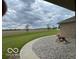 Beautiful landscaping and an expansive lush green lawn complement the serene outdoor setting at 11898 N 200 W, Fountaintown, IN 46130