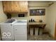 Laundry room featuring a washer and dryer and a table at 11898 N 200 W, Fountaintown, IN 46130