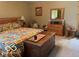 Bright primary bedroom with a wooden bed frame and a view of the outdoors at 11898 N 200 W, Fountaintown, IN 46130