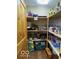 Pantry featuring wooden shelving, well-stocked with various food items at 11898 N 200 W, Fountaintown, IN 46130