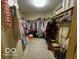 Large walk-in closet with ample shelving and storage for clothing and accessories at 11898 N 200 W, Fountaintown, IN 46130