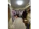 Large walk-in closet with ample shelving and storage for clothing and accessories at 11898 N 200 W, Fountaintown, IN 46130