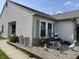 Delightful front yard with unique garden ornaments and landscaping, enhancing curb appeal at 1420 Wigwam Ln, Martinsville, IN 46151