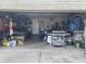 Spacious two-car garage with ample storage, and plenty of space for all your hobbies and tools at 1420 Wigwam Ln, Martinsville, IN 46151