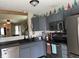Inviting kitchen space featuring updated appliances, sleek countertops, and a convenient layout for easy meal preparation at 1420 Wigwam Ln, Martinsville, IN 46151