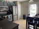 Modern kitchen featuring stainless steel appliances, gray cabinets, and a functional layout for cooking and dining at 1420 Wigwam Ln, Martinsville, IN 46151