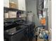 Well-organized laundry room with modern washer and dryer, shelving, and efficient utility systems at 1420 Wigwam Ln, Martinsville, IN 46151