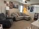 Comfortable living room space featuring a plush sofa and neutral color palette at 1420 Wigwam Ln, Martinsville, IN 46151