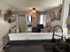 Open layout connecting the living room and kitchen areas with bar top at 1420 Wigwam Ln, Martinsville, IN 46151