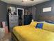 Comfortable main bedroom with modern decor, including a custom wooden bed frame and ample storage options at 1420 Wigwam Ln, Martinsville, IN 46151