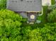 Overhead view of a beautiful home and large back deck surrounded by lush, mature trees, perfect for privacy at 14274 Matt St, Carmel, IN 46033