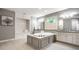 Bright bathroom features a soaking tub with built-in storage and dual vanity sinks with granite countertops at 14274 Matt St, Carmel, IN 46033