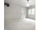 Empty room with soft carpet, a window, and light colored walls at 14274 Matt St, Carmel, IN 46033