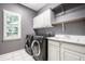 Practical laundry room with modern washer and dryer at 14274 Matt St, Carmel, IN 46033