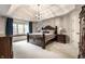 Spacious main bedroom with vaulted ceiling and large window at 14274 Matt St, Carmel, IN 46033