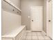 Hallway featuring storage bench and hooks for organization at 14274 Matt St, Carmel, IN 46033