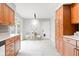Eat-in kitchen with tile floors features table, chairs and access to the backyard at 1440 Fenwick Ave, Indianapolis, IN 46219