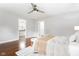 Bedroom with hardwood floors and an ensuite bathroom at 1440 Fenwick Ave, Indianapolis, IN 46219