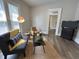 Comfortable living room with wood floors, stylish furniture and natural light at 1440 Sycamore St, Columbus, IN 47201