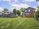 Well-maintained lawn and spacious backyard with back deck, perfect for outdoor living at 150 E 46Th St, Indianapolis, IN 46205