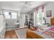 Bedroom with hardwood floors and two windows at 150 E 46Th St, Indianapolis, IN 46205