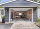 Spacious garage with ample workspace, pegboard, and lighting at 150 E 46Th St, Indianapolis, IN 46205
