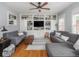 Living room with built in shelves, ceiling fan, sofas and area rug at 150 E 46Th St, Indianapolis, IN 46205