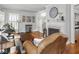 Comfortable living room featuring a fireplace, hardwood floors, and stylish decor at 150 E 46Th St, Indianapolis, IN 46205