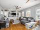 Spacious living room featuring built-in shelving and a comfortable seating area at 150 E 46Th St, Indianapolis, IN 46205