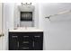 Bathroom featuring vanity with dark wood cabinets and white countertop, and chrome hardware at 15264 Ten Point Dr, Noblesville, IN 46060
