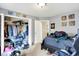 Bedroom features a closet with an assortment of clothes and personal items at 15264 Ten Point Dr, Noblesville, IN 46060
