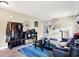 Bright and airy living space with modern furnishings, laminate floors, and a neutral color palette at 15264 Ten Point Dr, Noblesville, IN 46060