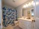 Bright bathroom featuring double sink vanity, and stylish accents at 15675 Myland Dr, Noblesville, IN 46062