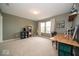 Bright bedroom with neutral paint, large window, plush carpet and ceiling light at 15675 Myland Dr, Noblesville, IN 46062